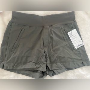 Athleta Trekke North Shorts.  Color Olive green.  Size 6.  New with tags.